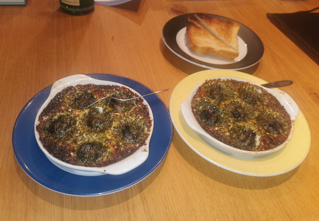 Gratinierte Schnecken in Kräuterbutter